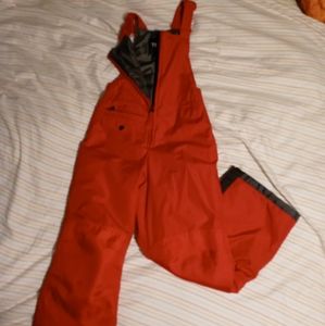 hardly worn kid's red snow bibs.